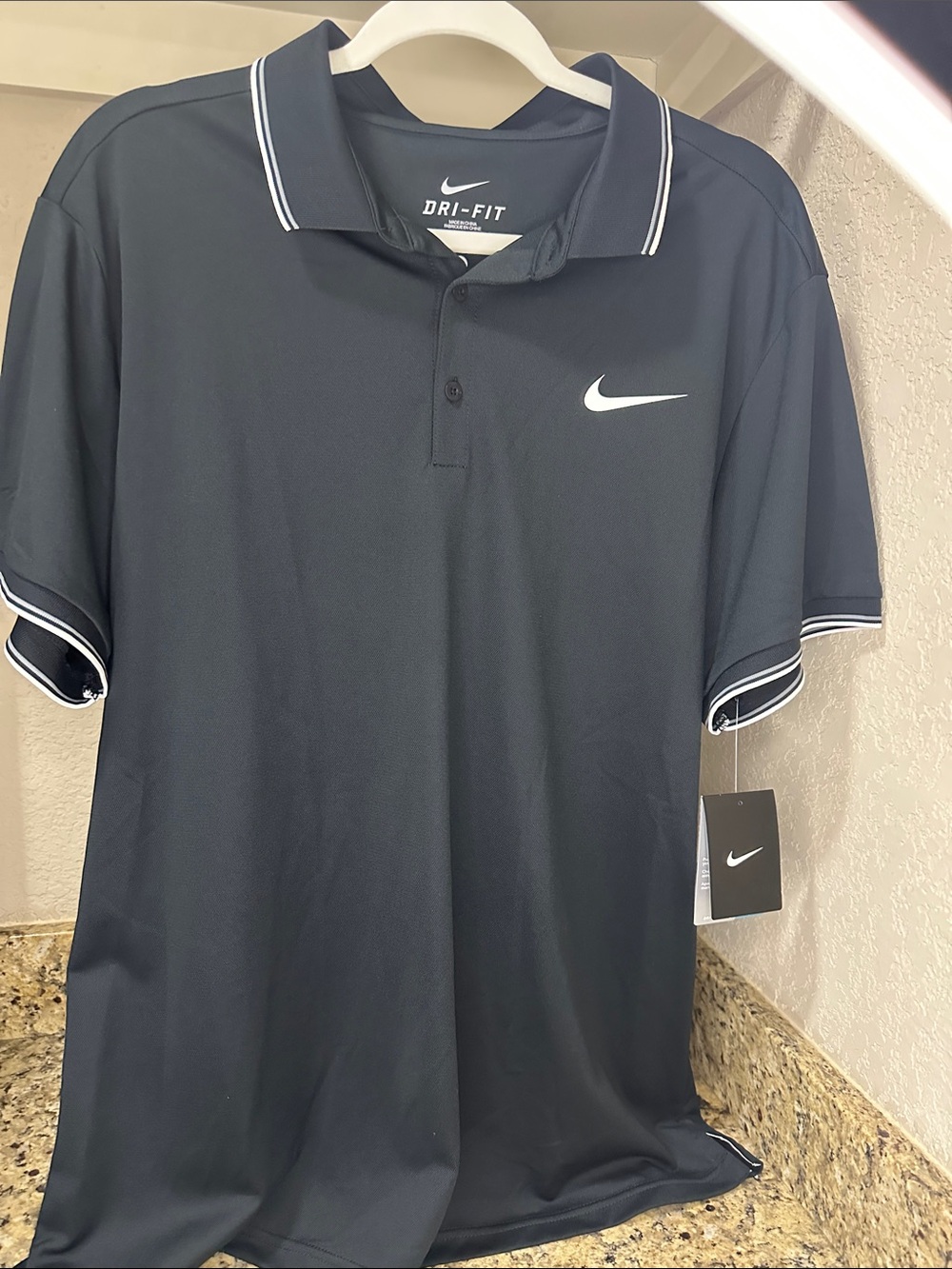 Nike Black Polo with White Swoosh and White-Trim Collar Size XL